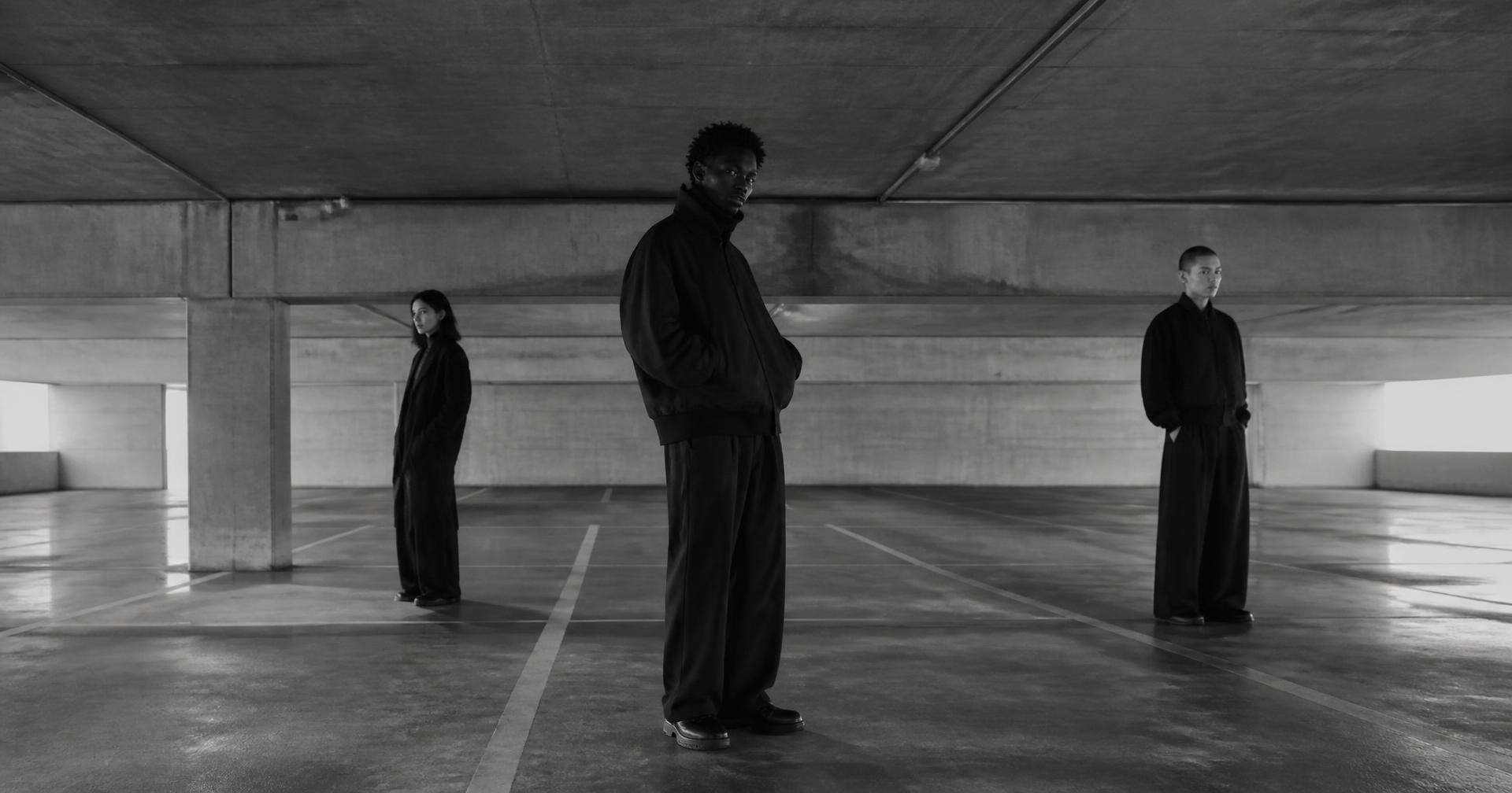 BORN UNRULED DROP 001 campaign image in an empty concrete car park